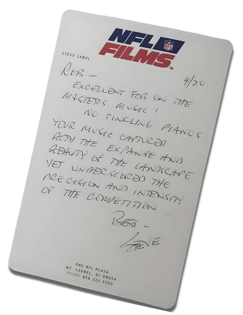 Handwritten note on NFL Films stationery with a logo at the top. The note is addressed to Rob and praises his music, mentioning no tinkling pianos and the landscape's expansion. Signed by Steve, dated 4/20. Location and contact info at the bottom.