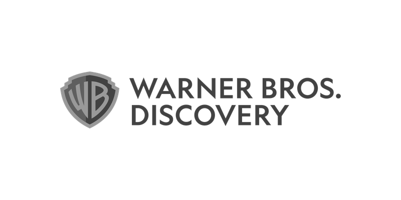 Warner Bros. Discovery logo in black and white.