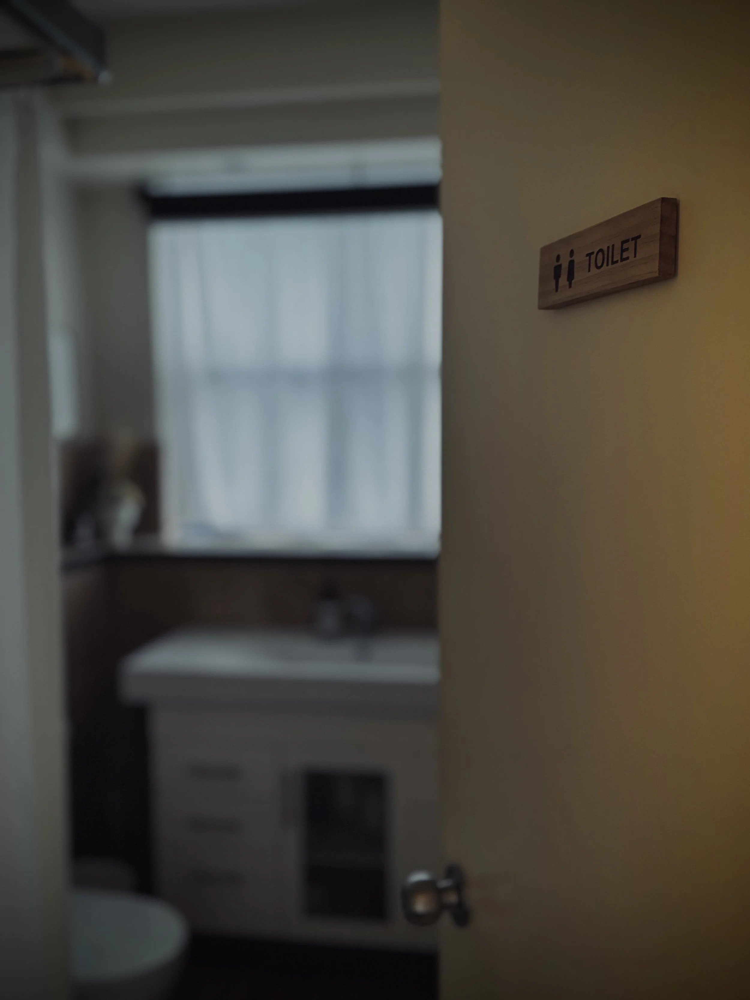 Thoughtfully designed guest bathroom and shower facilities in a clean, private wellness space.