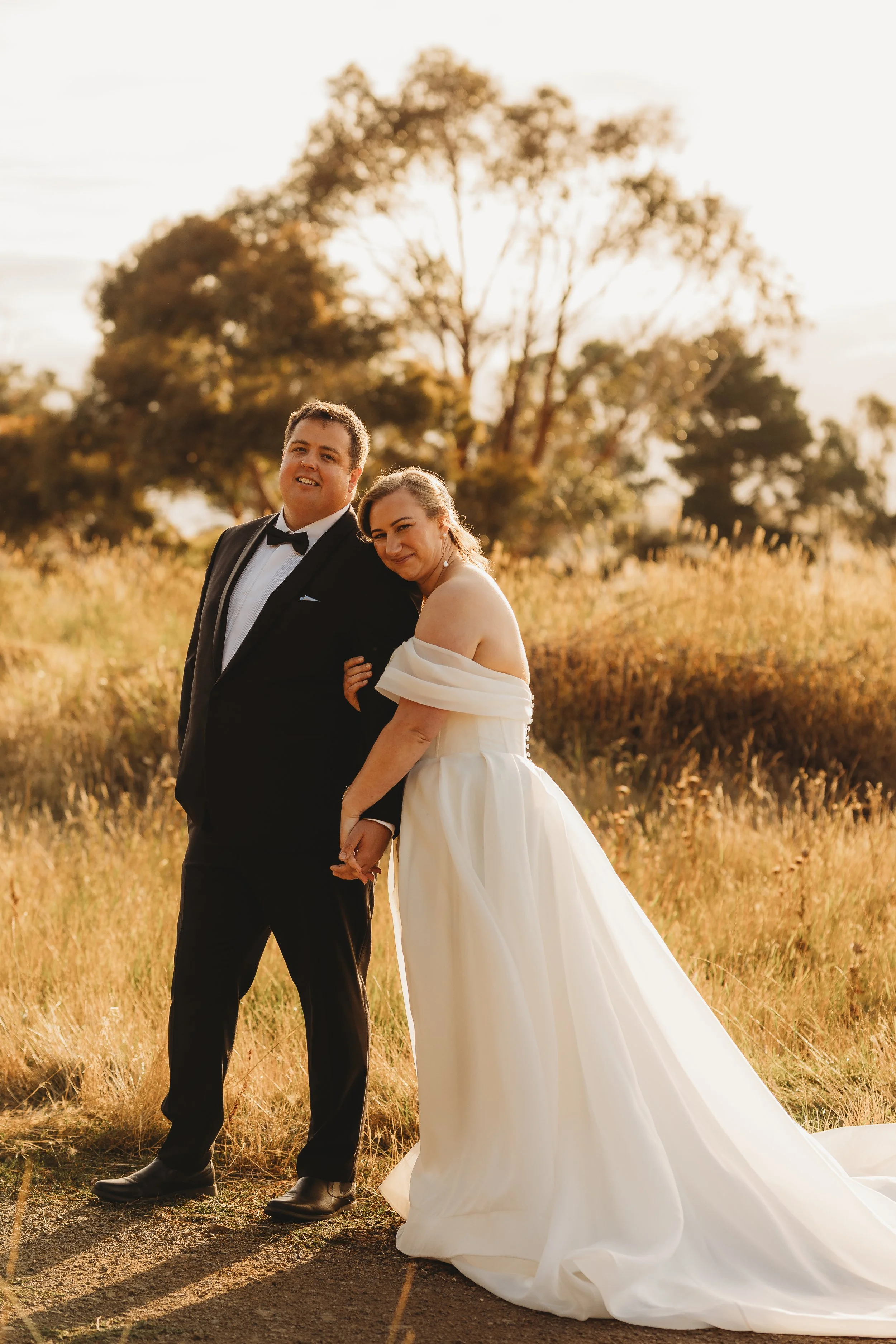 bride and groom together in the golden hour