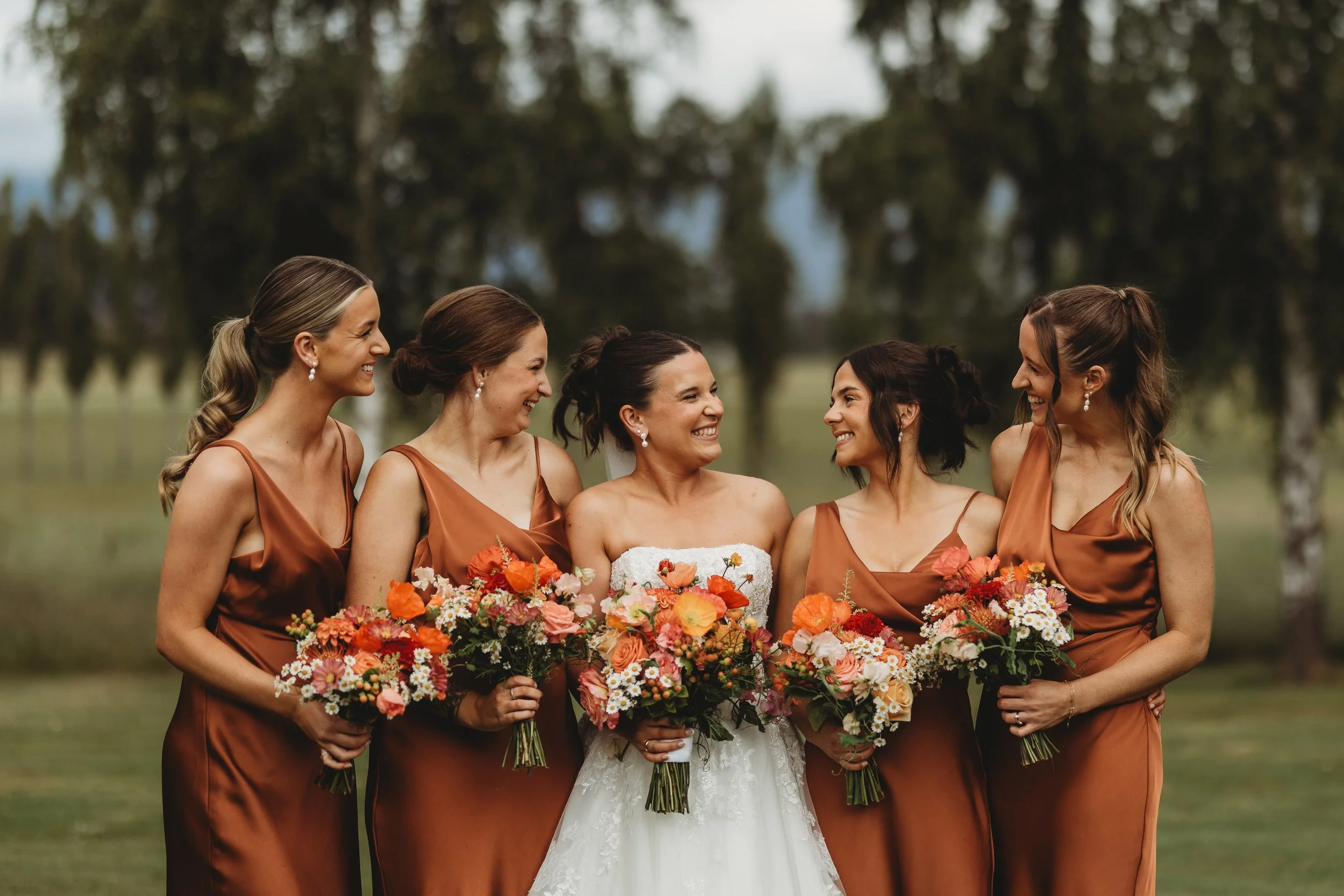 bride with her bridesmaid on wedding day