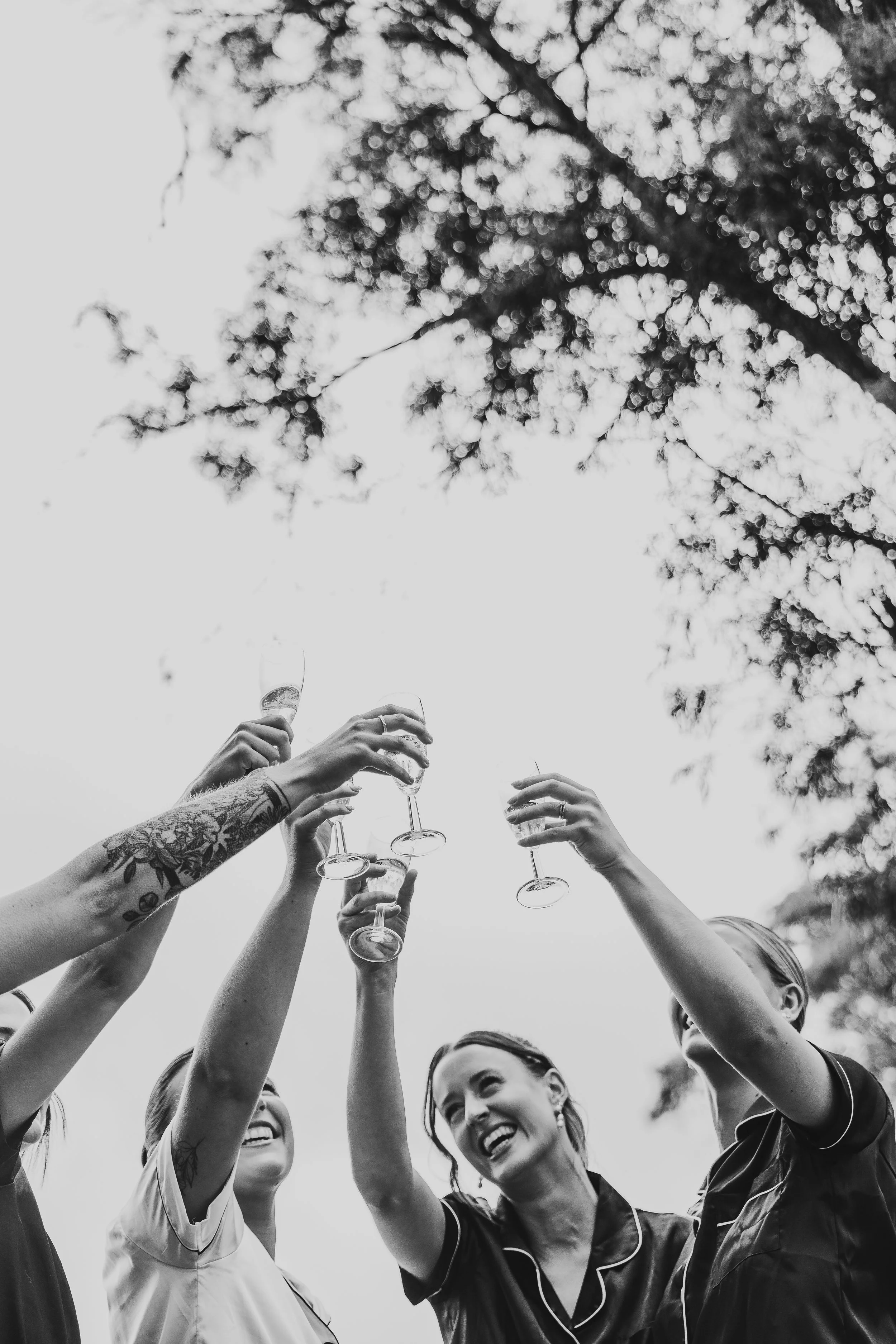 bridesmaid doing a cheers on wedding day
