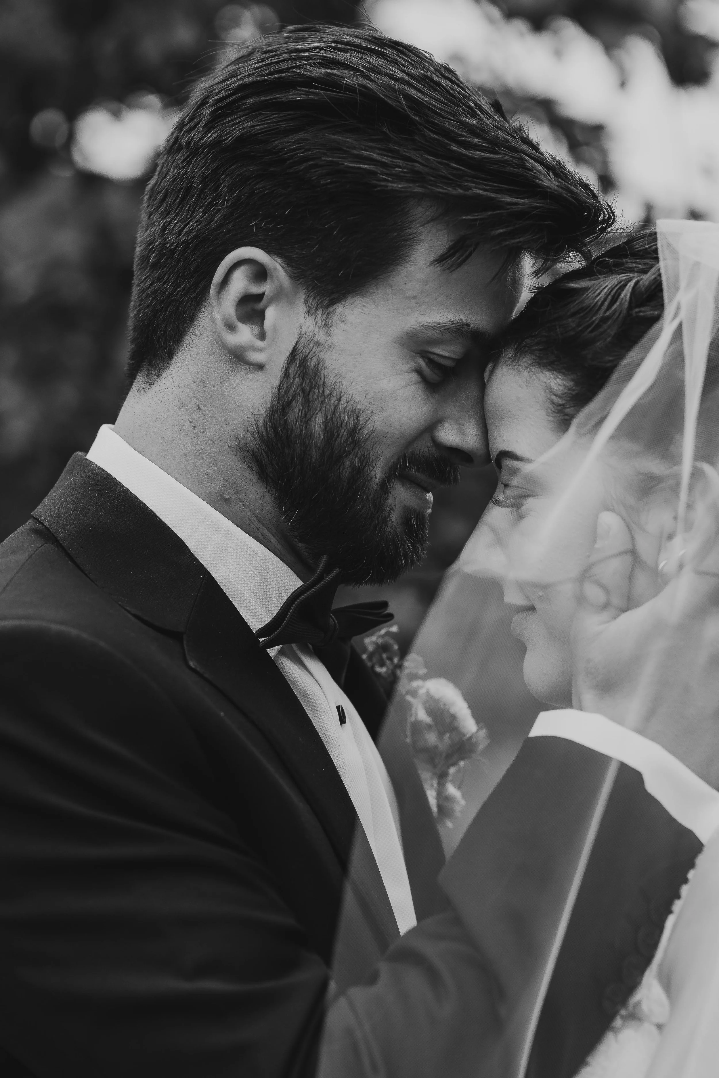 Husband and wife embracing on wedding day 