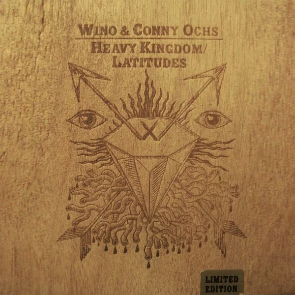 
WINO & CONNY OCHS, "HK/LATITUDES" (BOXSET), 2012 /// Cover of the limited edition Boxset of W&C´s 2012 combi release of "Heavy Kingdom" and "Latitudes". Processing by Andreas Kohl of and for Exile on Mainstream Records.
