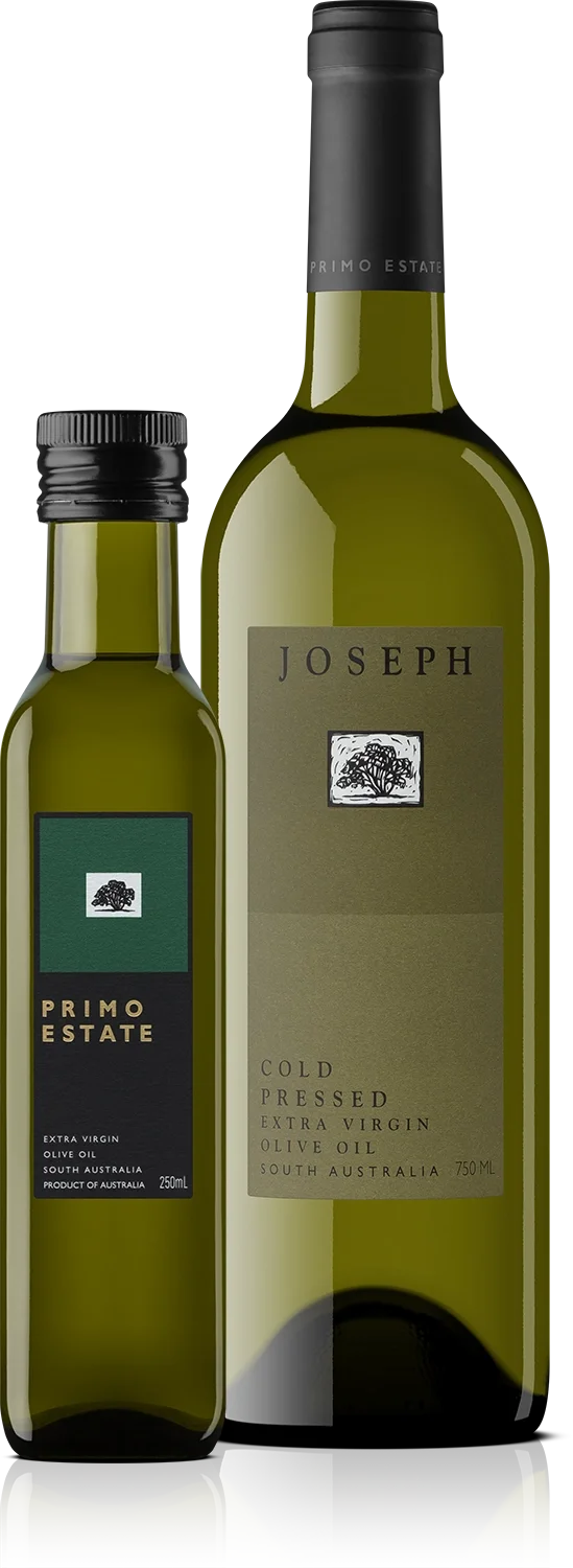 Two bottles of Primo Estate extra virgin olive oil, one smaller 250ml bottle and one larger 750ml bottle, both with black caps and labels with a tree logo.