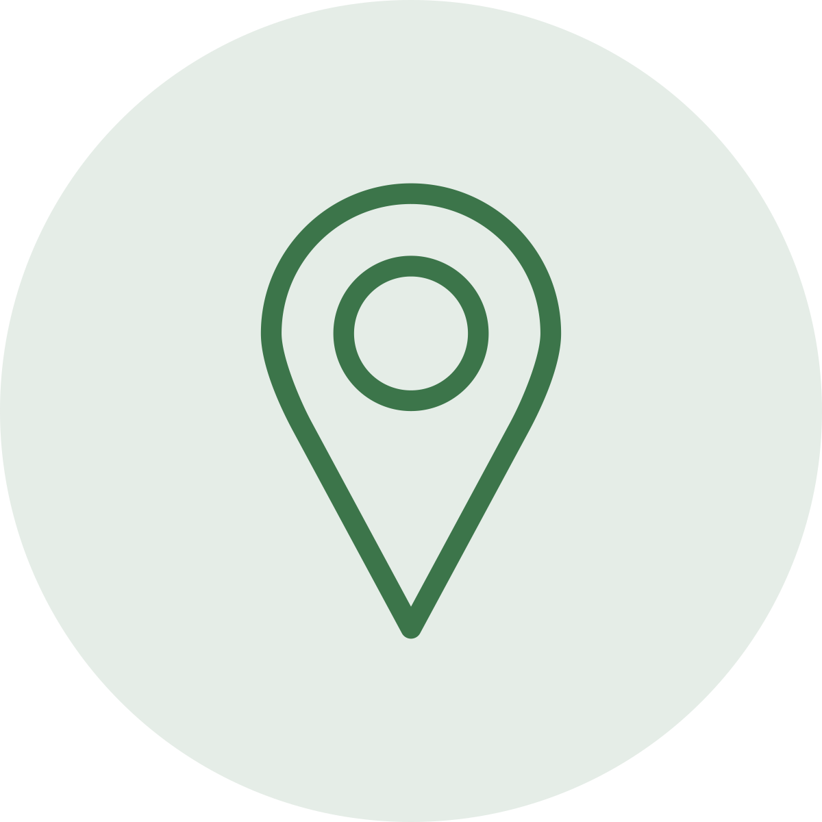 A green location pin icon on a light green circular background.
