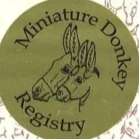 Logo of the Miniature Donkey Registry featuring two donkey heads and the organization name encircling them.
