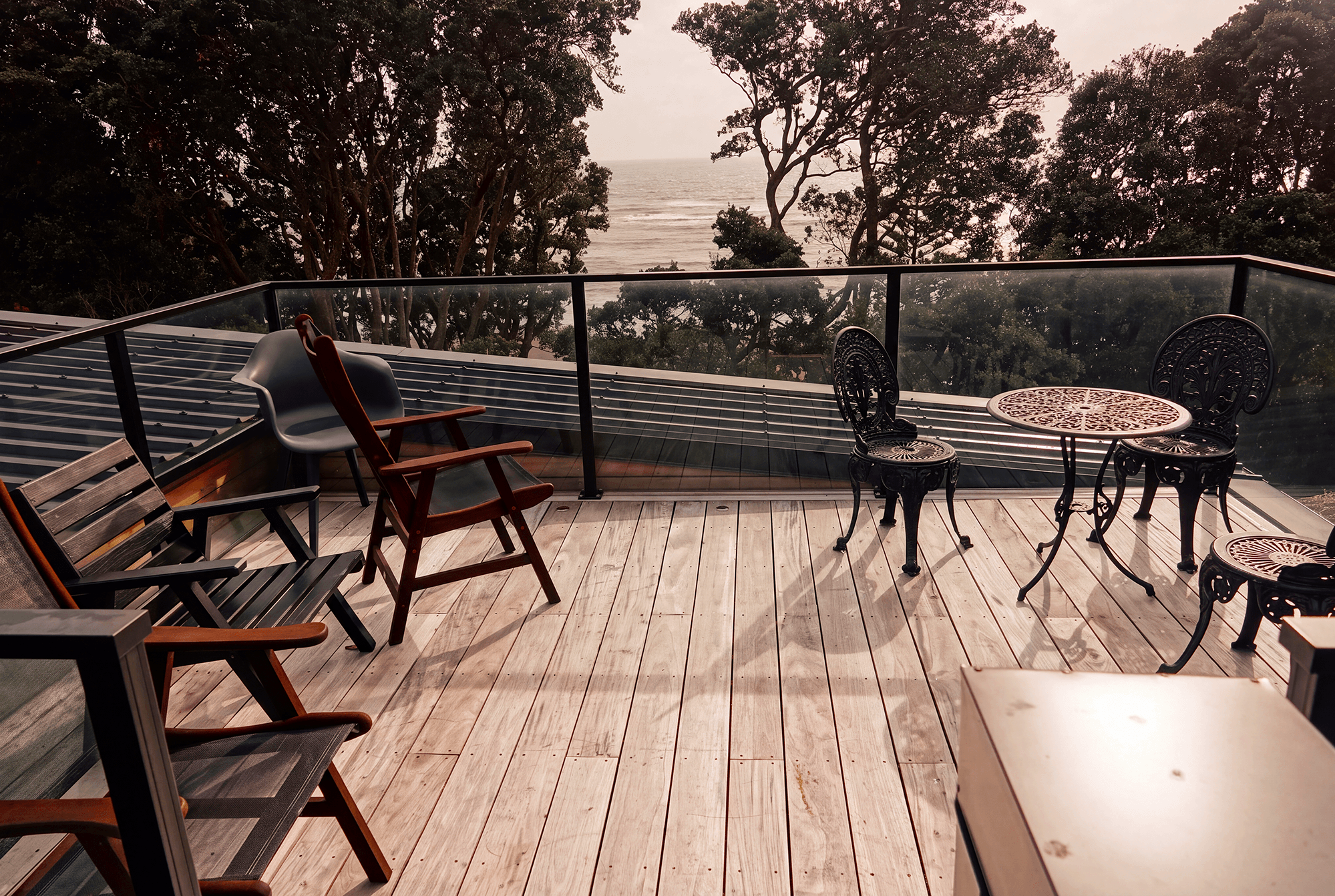 Adams Building outdoor deck with glass balustrade and coastal views in New Plymouth, Taranaki.