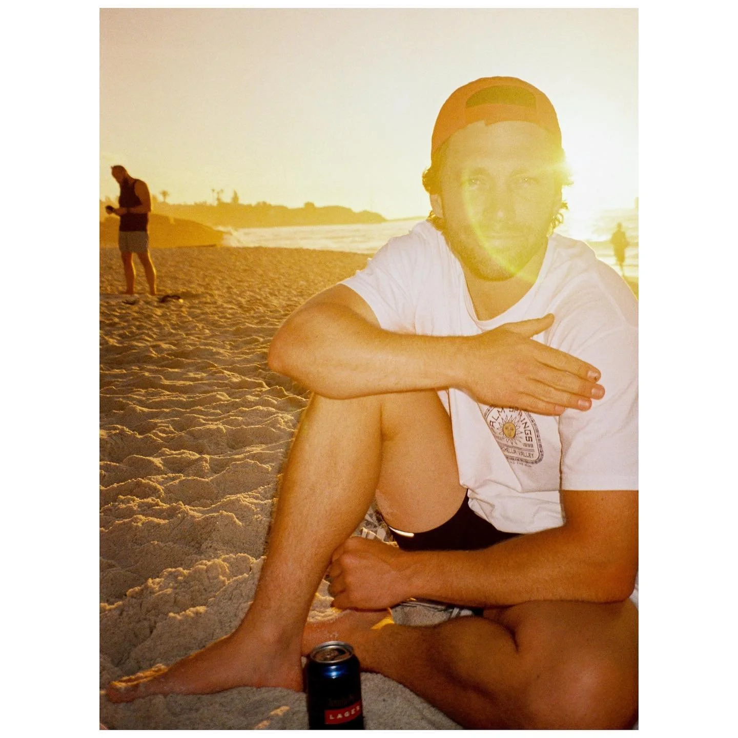 @mr_danwalsh kindly took a photo of me (illegally drinking on the beach) on his point &amp; shoot, as well as on my camera. 1x digital 1x film. To be fair his point &amp; shoot fired flash which helps a tricky exposure, but the tones from the film sc