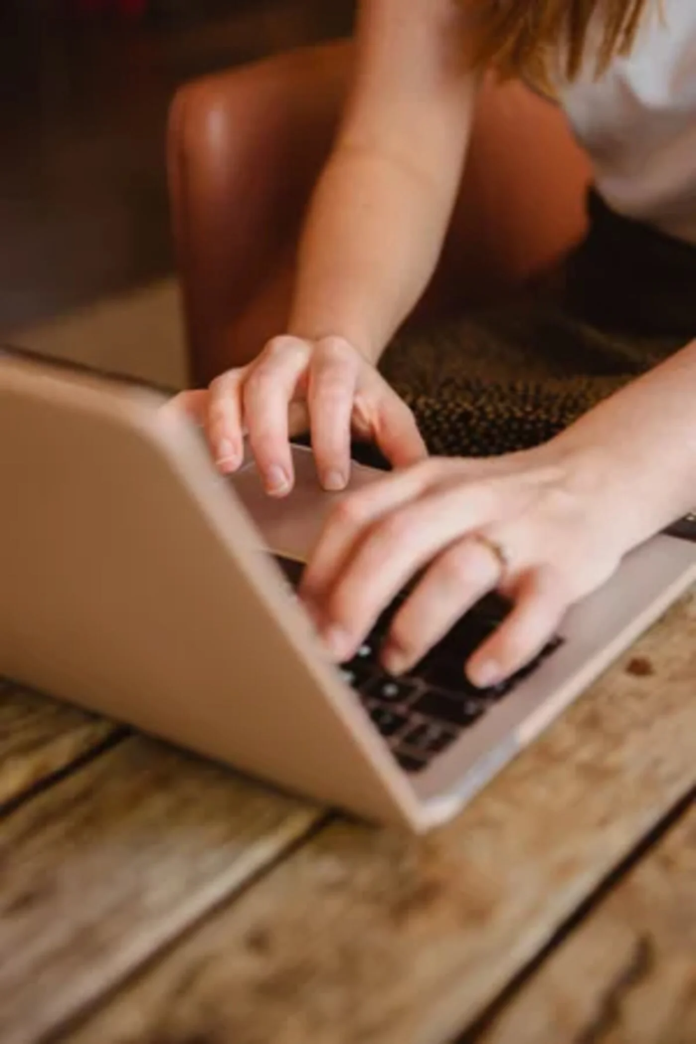 Marketing consultant working on a laptop for an interior design business