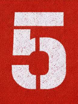 White number 5 on a red textured background