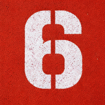 White number six on a red background