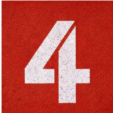 Close-up of a red surface with a white number 4 painted on it.