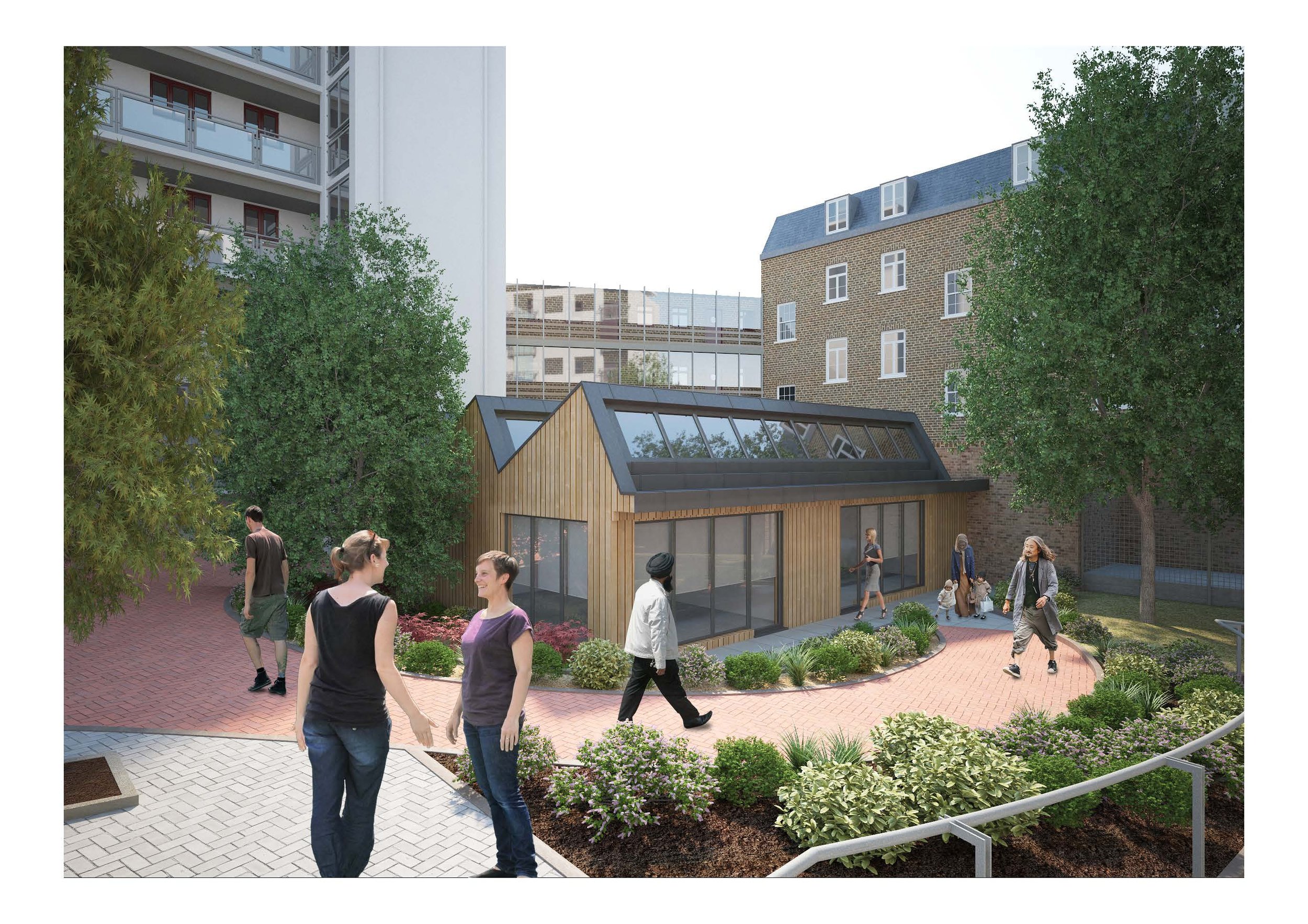 View of the modern rear extension with ZIG ZAG roof, green roof and timber cladding walls. New garden and landscaping. Kings Cross Community HUB