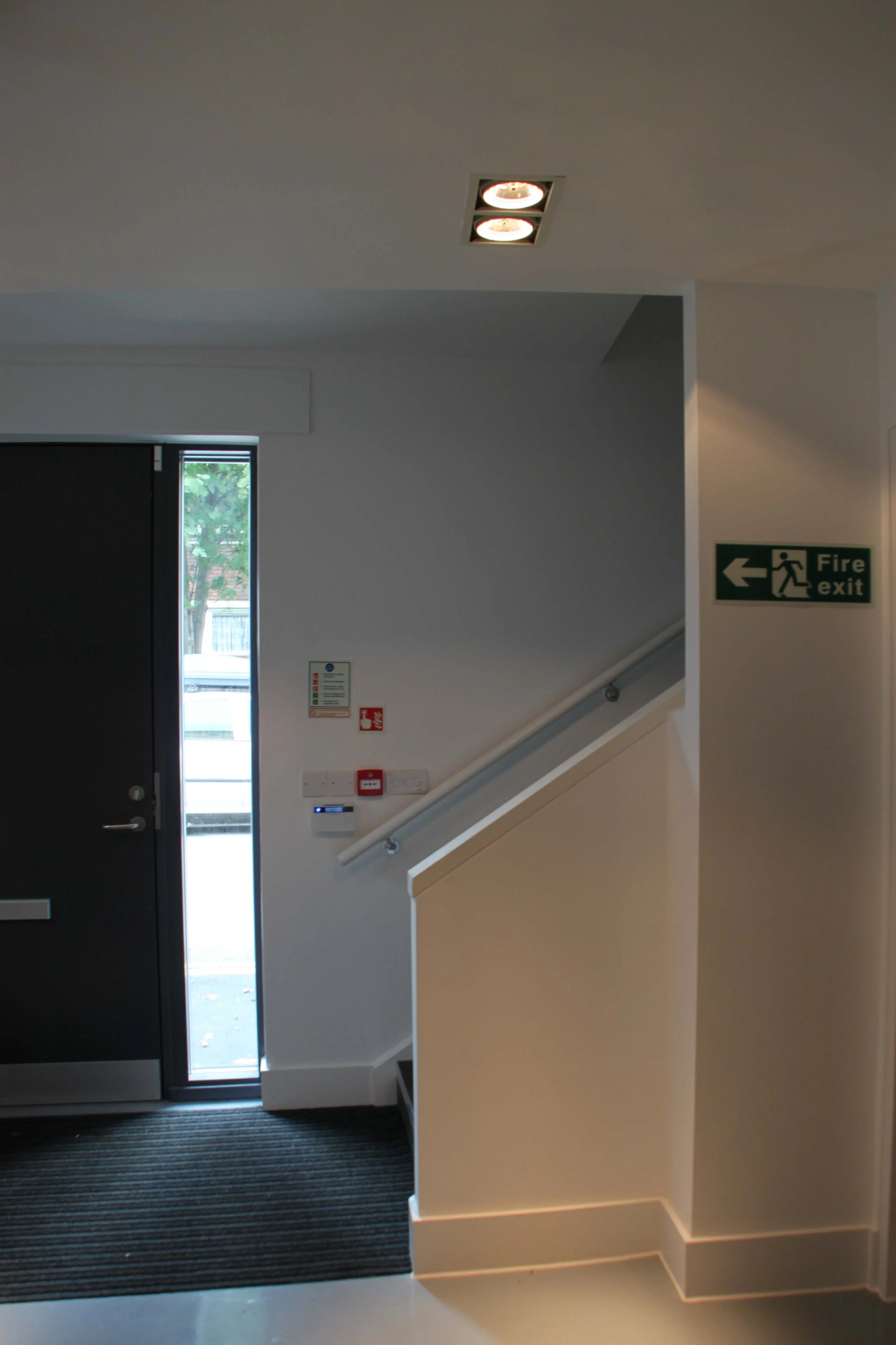 Detail of the entrance and of the staircase to the first floor. Sparkplug