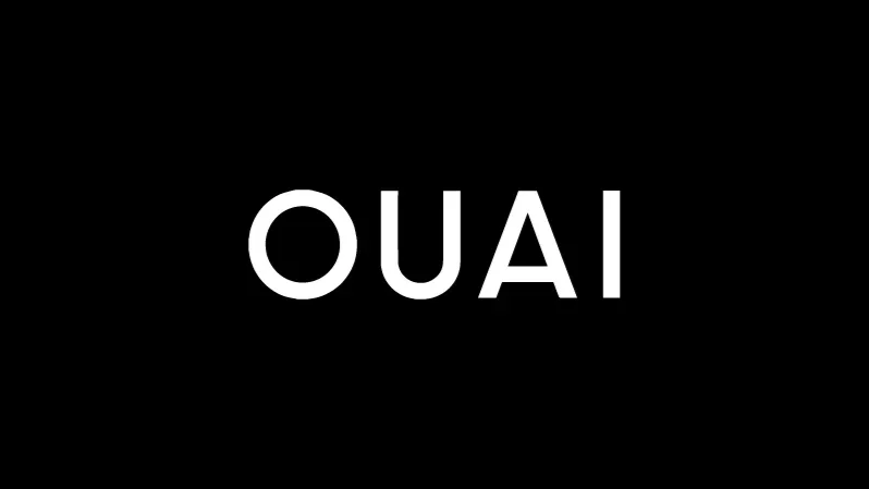 Black background with white text reading 'OUAI'