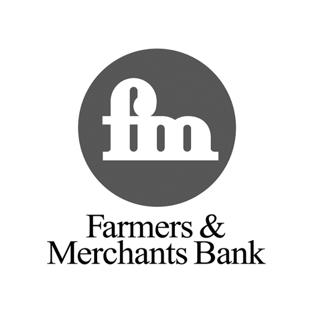 Logo of Farmers & Merchants Bank with a stylized gray circle and white lowercase "f" "m" inside, followed by the bank's name in black text.