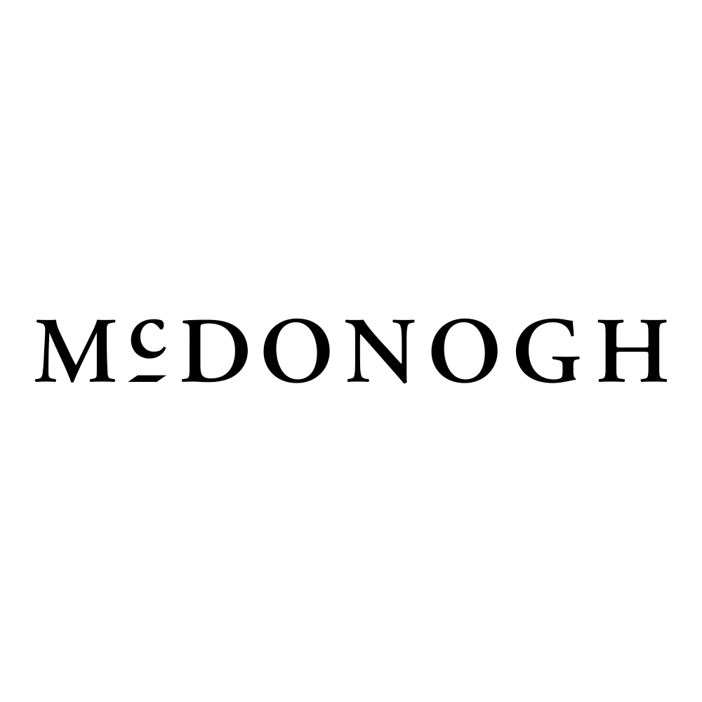 McDonogh logo with stylized black text on a white background.