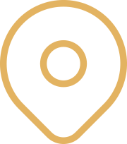 A gold and black location pin icon on a white background.