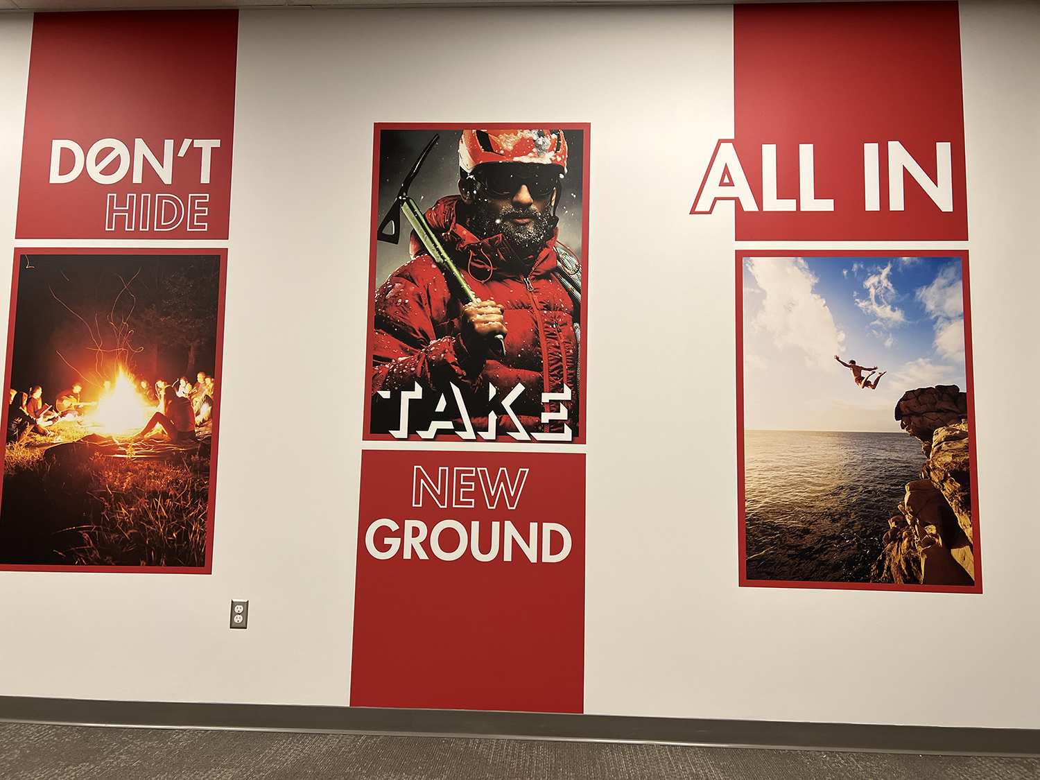 A motivational poster with three sections, featuring outdoor adventure scenes and text. The left section shows people sitting around a campfire at night with the words 'DON'T HIDE'. The center section has a photo of a man in a red jacket and helmet h