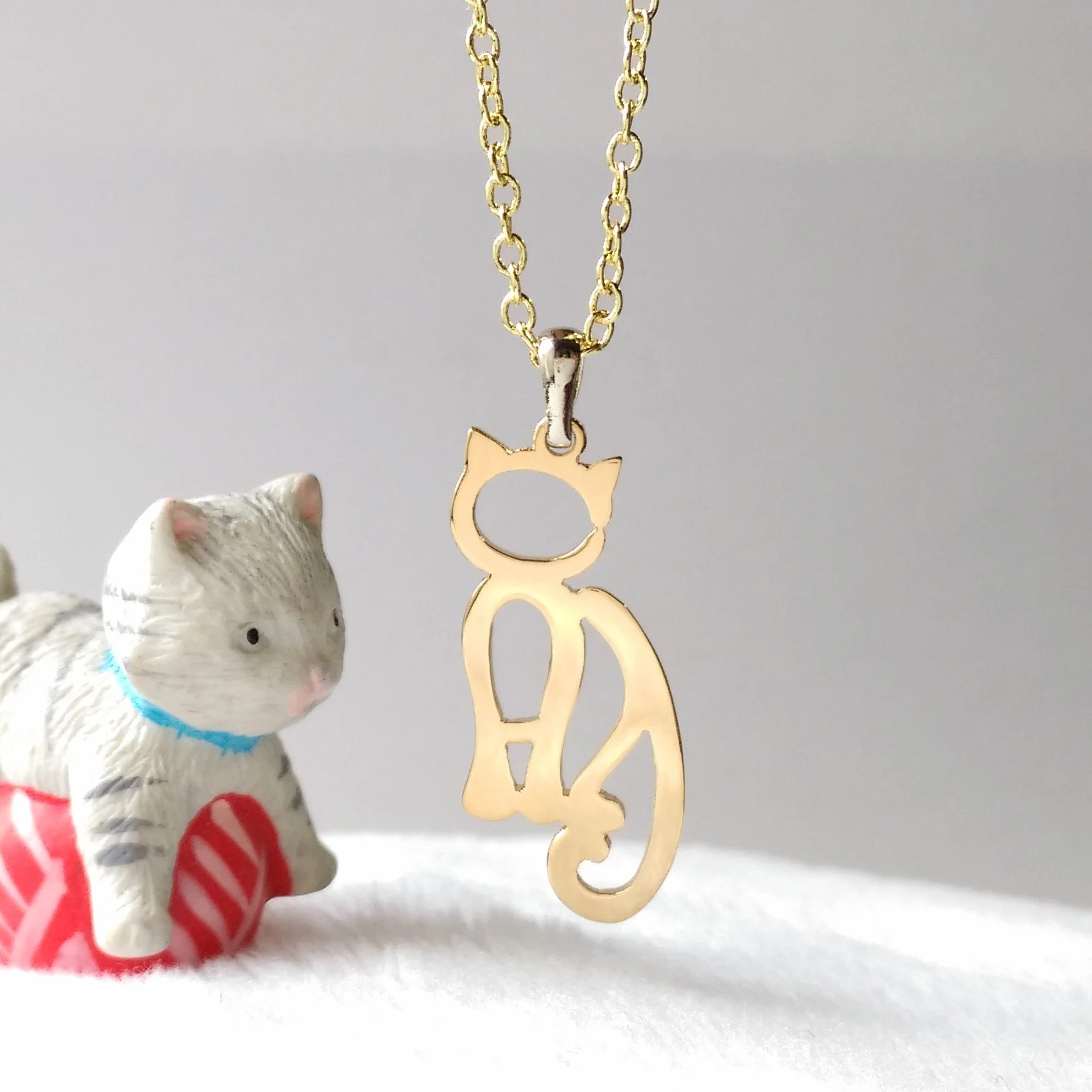 Cat in English necklace.jpg