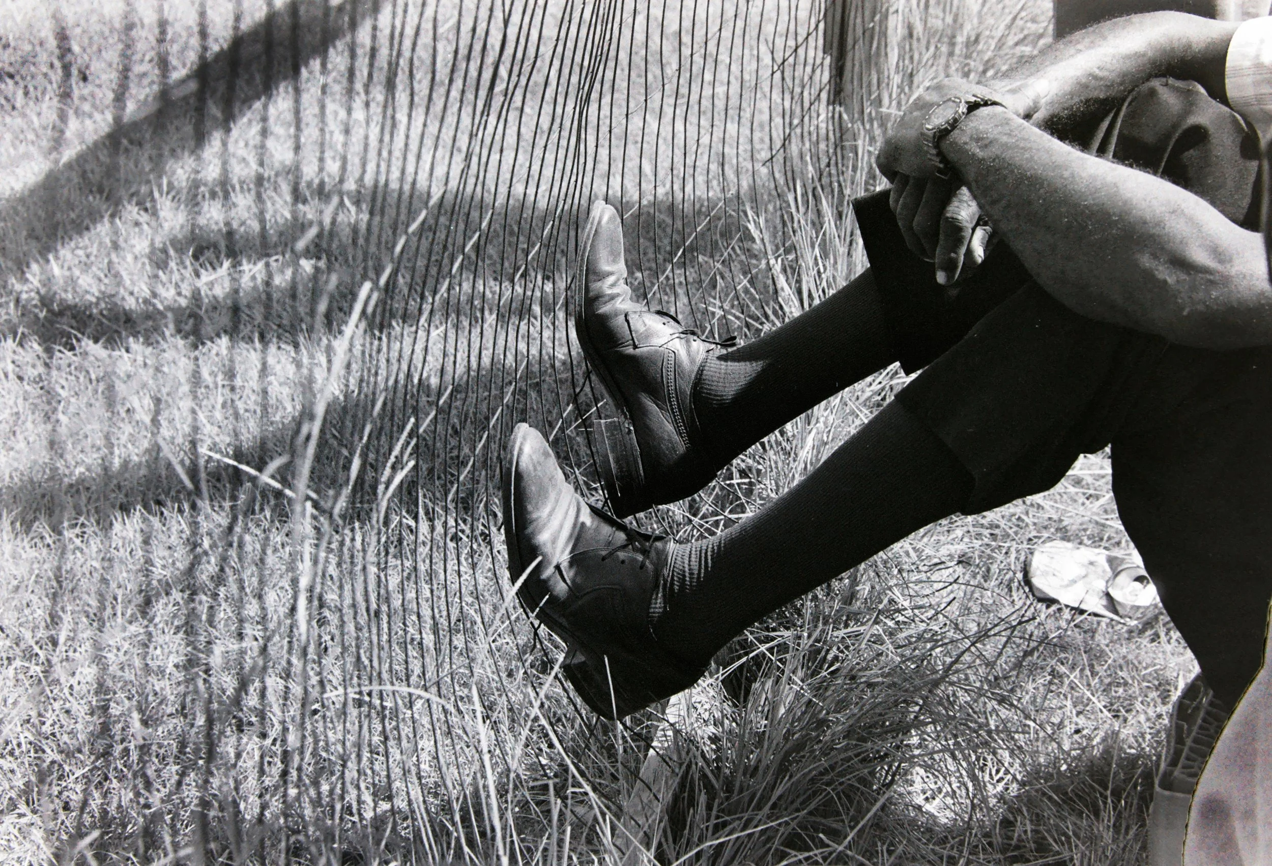 Spectator Shoes On Fence