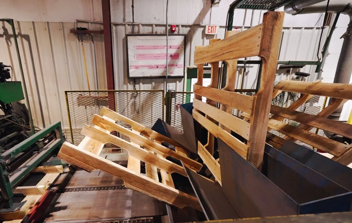 wood pallets being made on a machine