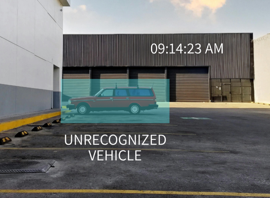 A parking lot with an unrecognized vehicle parking in a designated space, with a building in the background. The image displays the time as 09:14:23 AM, and a label indicates that the vehicle is unrecognized.