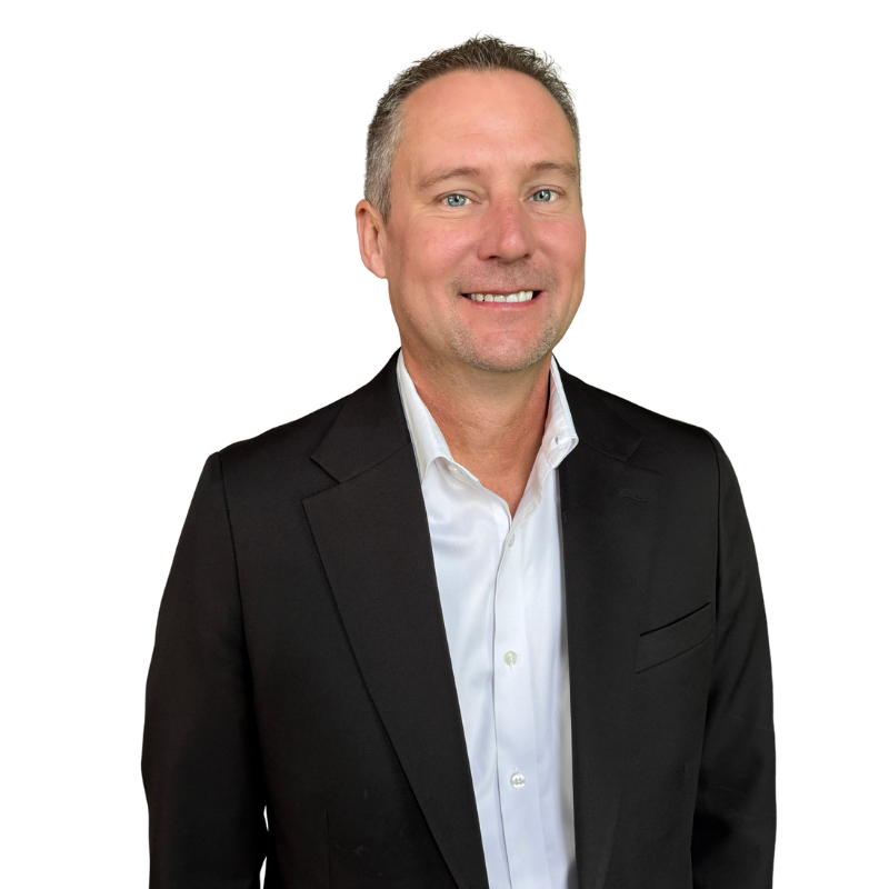 A headshot of Glen Carter, Clear Watch founder and CEO, wearing a black blazer over a white shirt, against a plain white background.