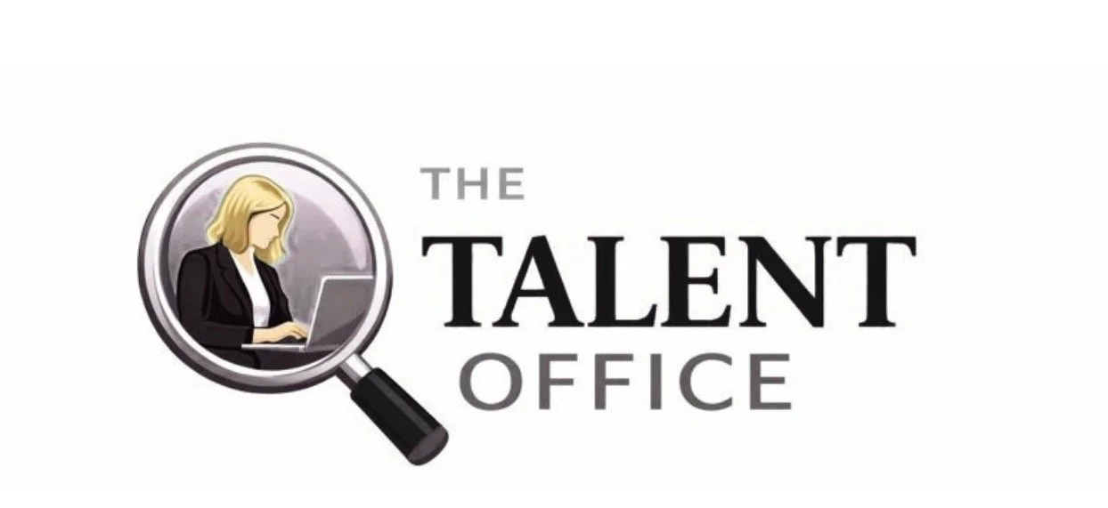 Logo for The Talent Office featuring a blonde woman working on a laptop inside a magnifying glass.
