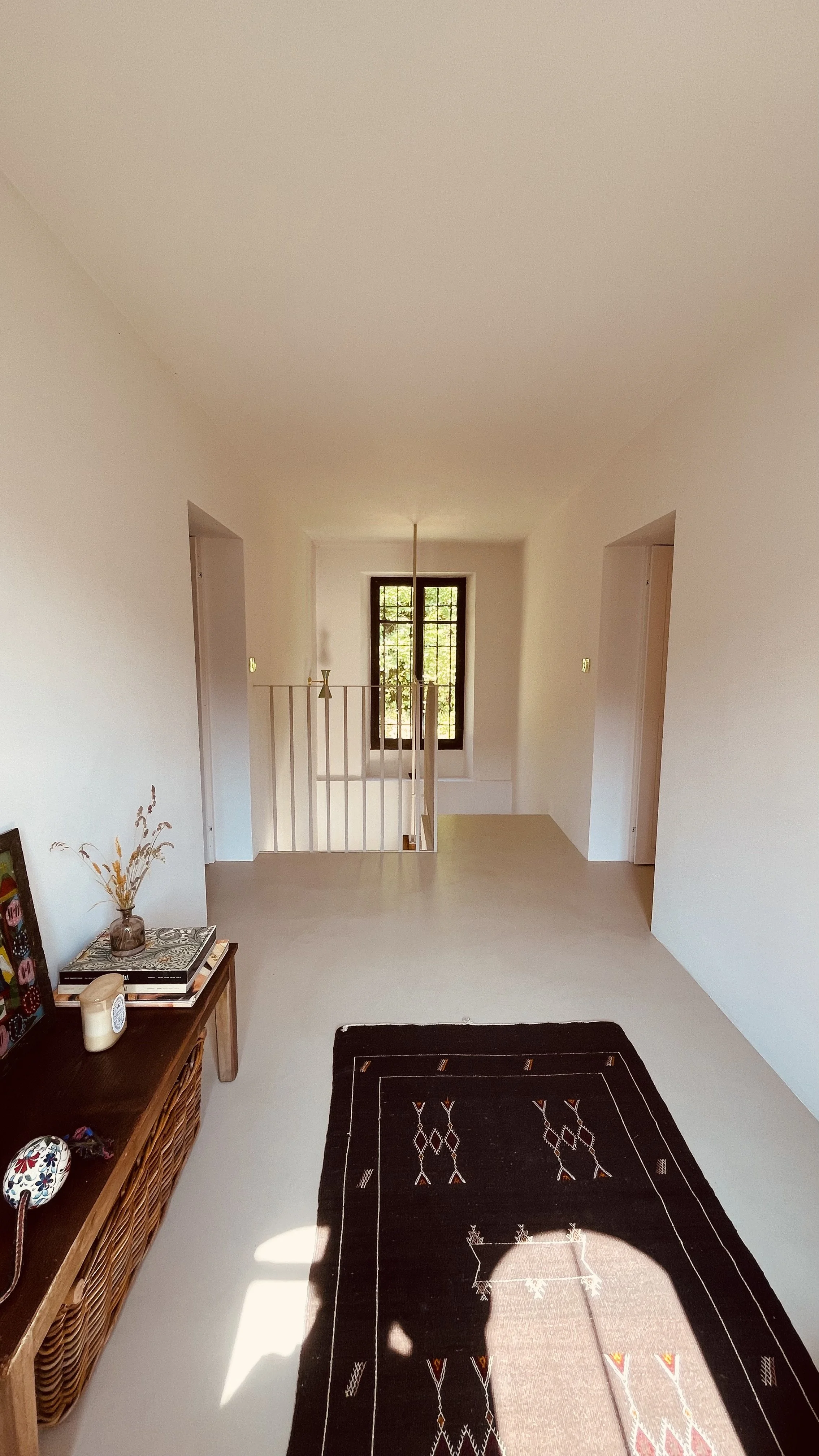 Bright attic landing and reading area at Villa Oberti, a charming villa near Mondovì and the Langhe in Piedmont