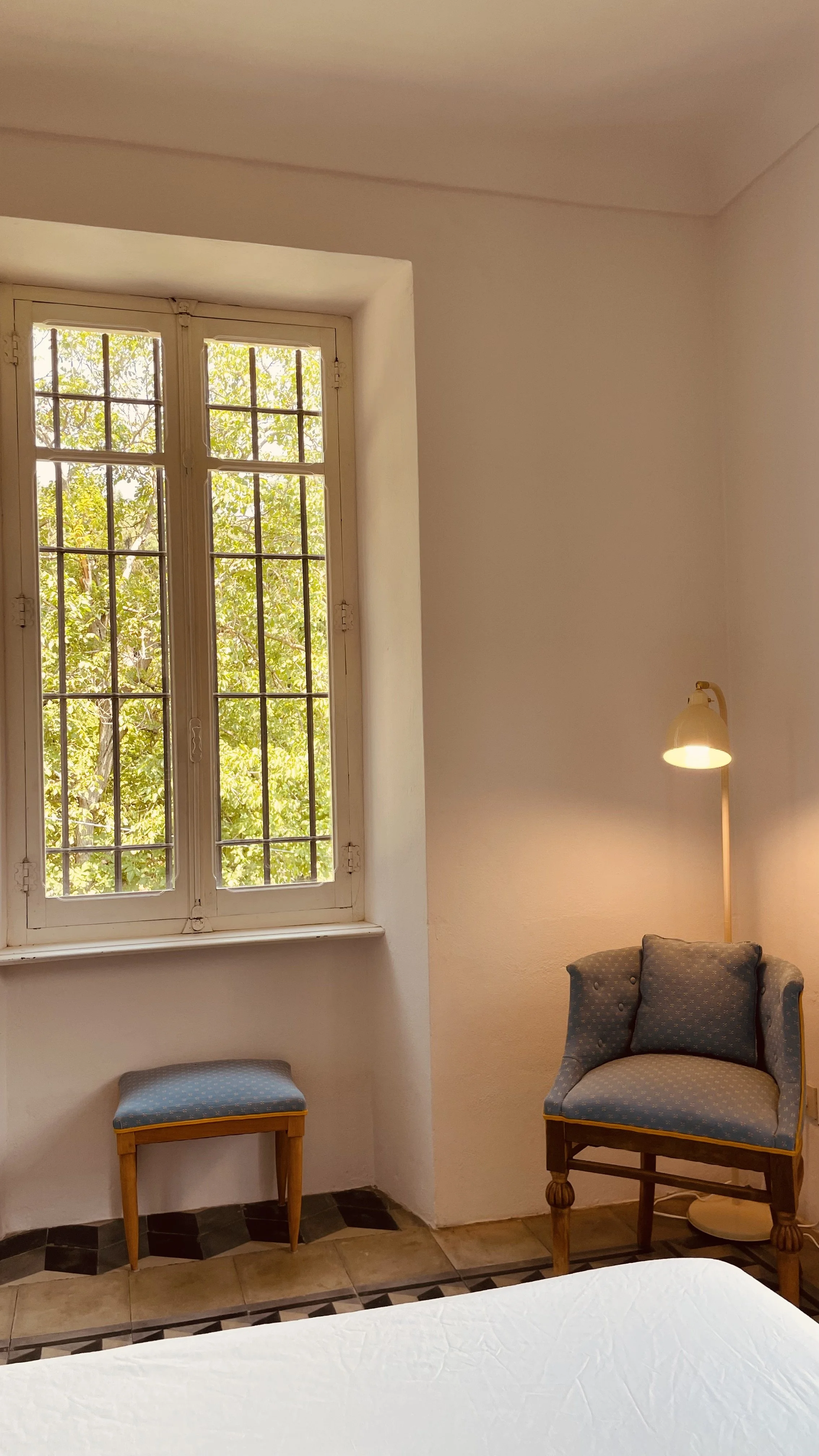 Quiet reading corner in the Master Bedroom at Villa Oberti, a private countryside villa near Mondovì in Piedmont