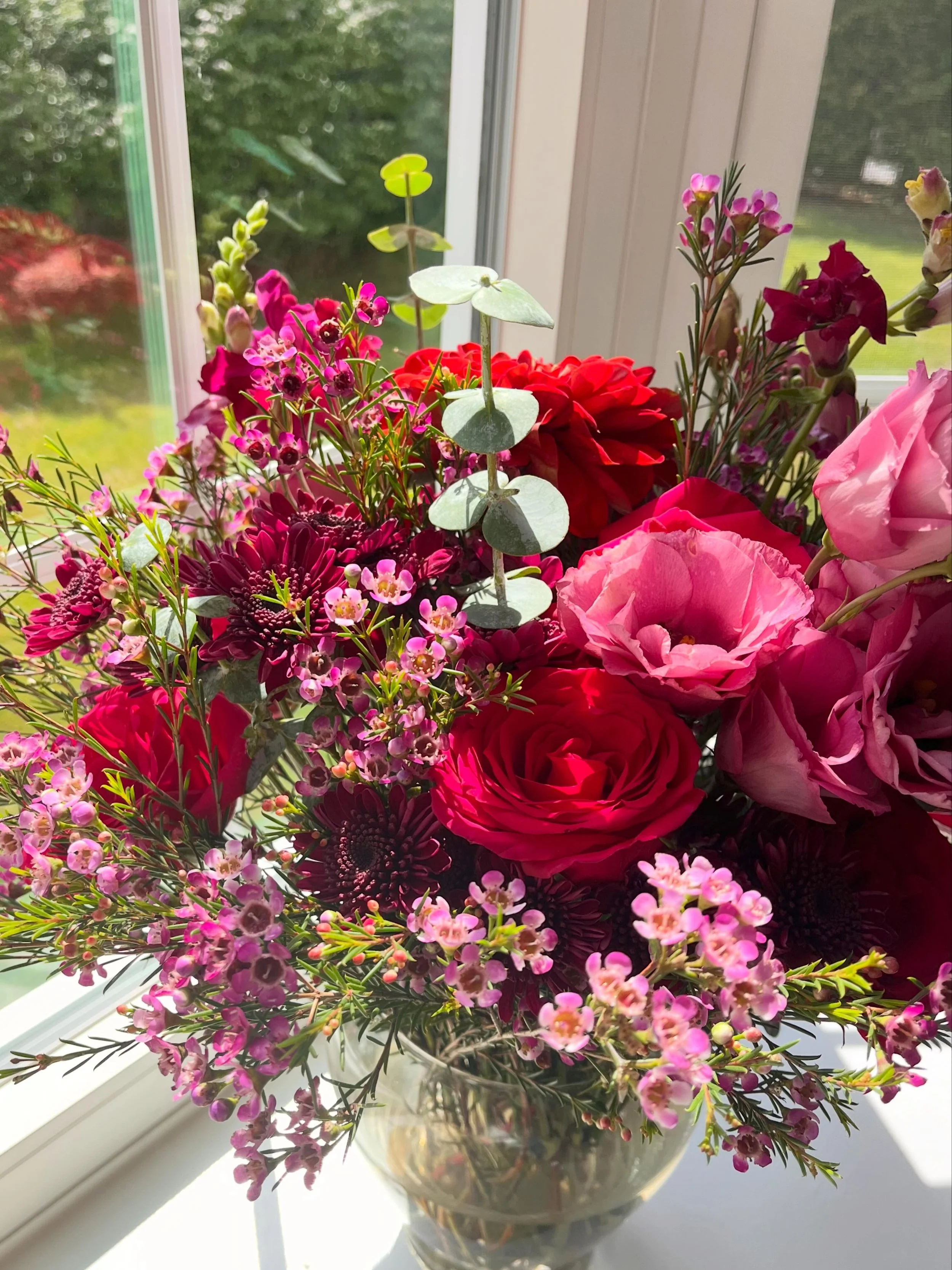 My in-laws celebrated 50 years of marriage this weekend, which called for an abundant bouquet to mark the occasion. Featuring Burnley Blooms lisianthus, snapdragons, and zinnias supplemented by pink roses, magenta mums, purple wax flowers and eucalyp
