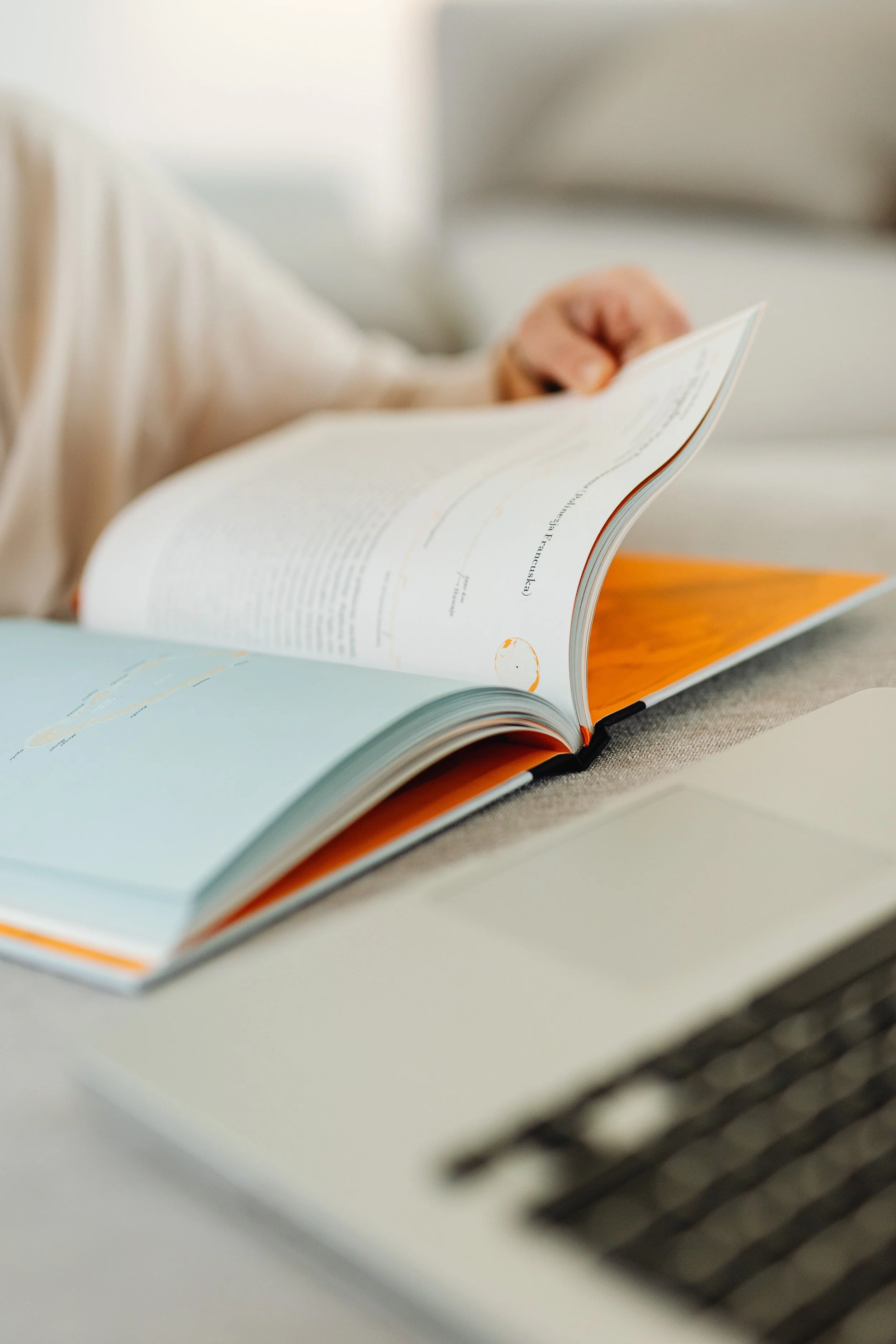 Open operations manual showing structured documentation and process pages