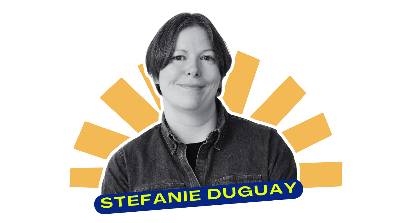 A black and white photo of a woman with short hair, smiling, wearing a denim shirt. Overlayed text reads 'STEFANIE DUGUAY' in yellow on a blue background.