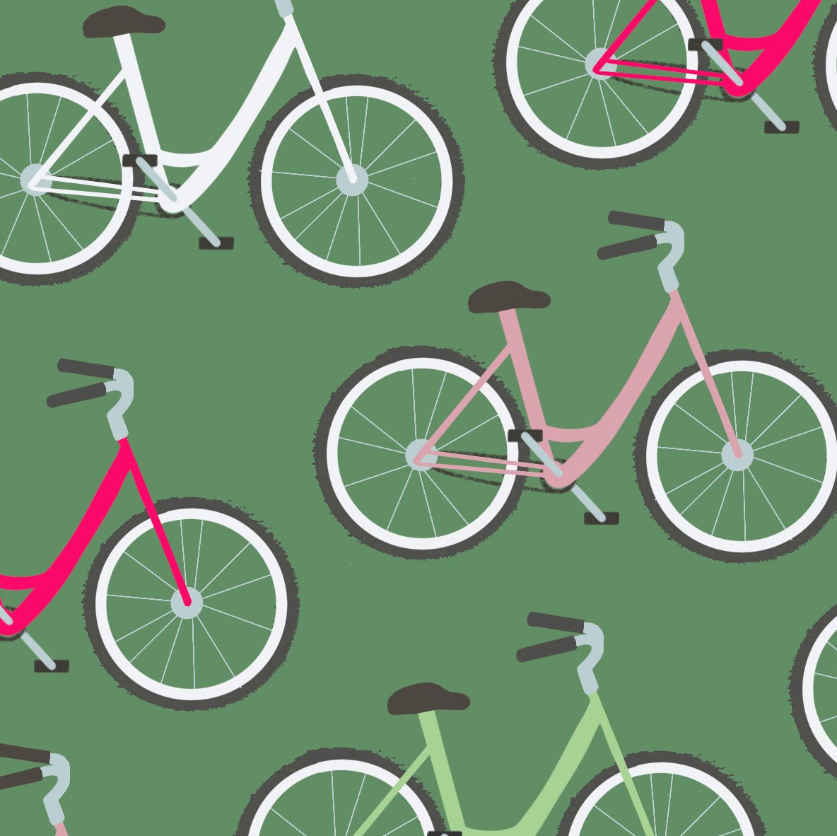 Pattern of various colored bicycles on a green background.