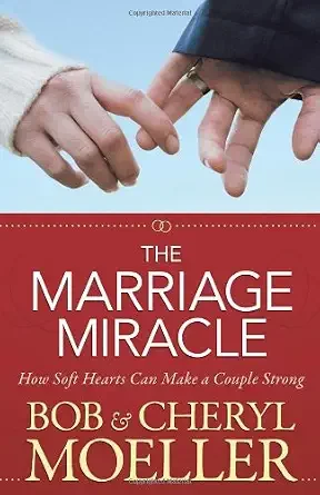 Close-up of two hands touching, one with a wedding band, against a light blue background; book cover titled "The Marriage Miracle" by Bob and Cheryl Moeller.