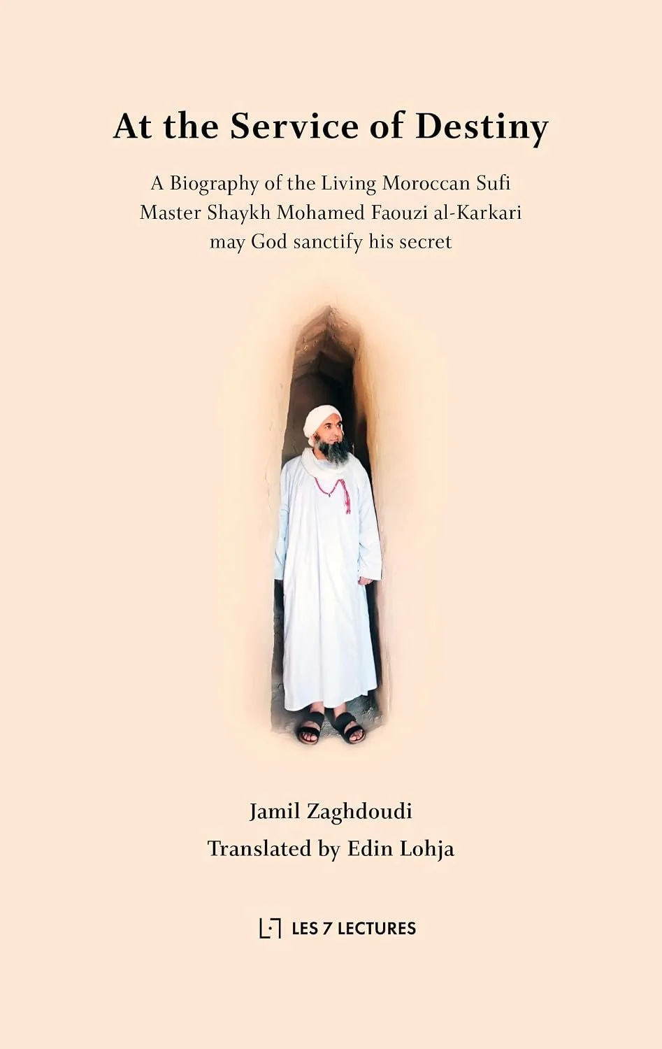 Book cover titled 'At the Service of Destiny,' featuring a man in traditional Moroccan Sufi attire standing in a narrow passage, with subtitle about a biography of Master Shaykh Mohamed Fauzi al-Karkari, translated by Edin Lojha.