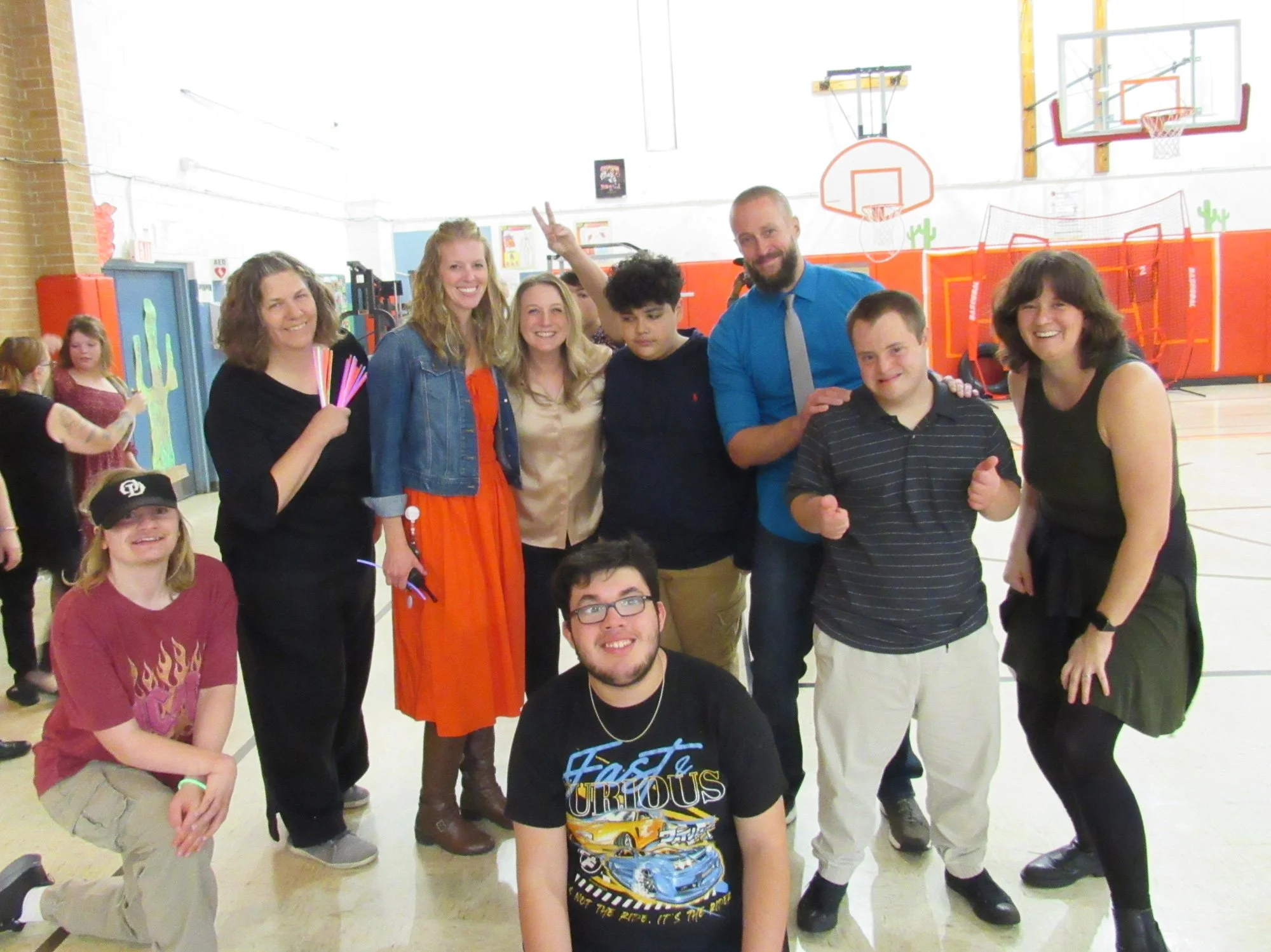 ClareWoods-GroupPhoto-InGym.jpg
