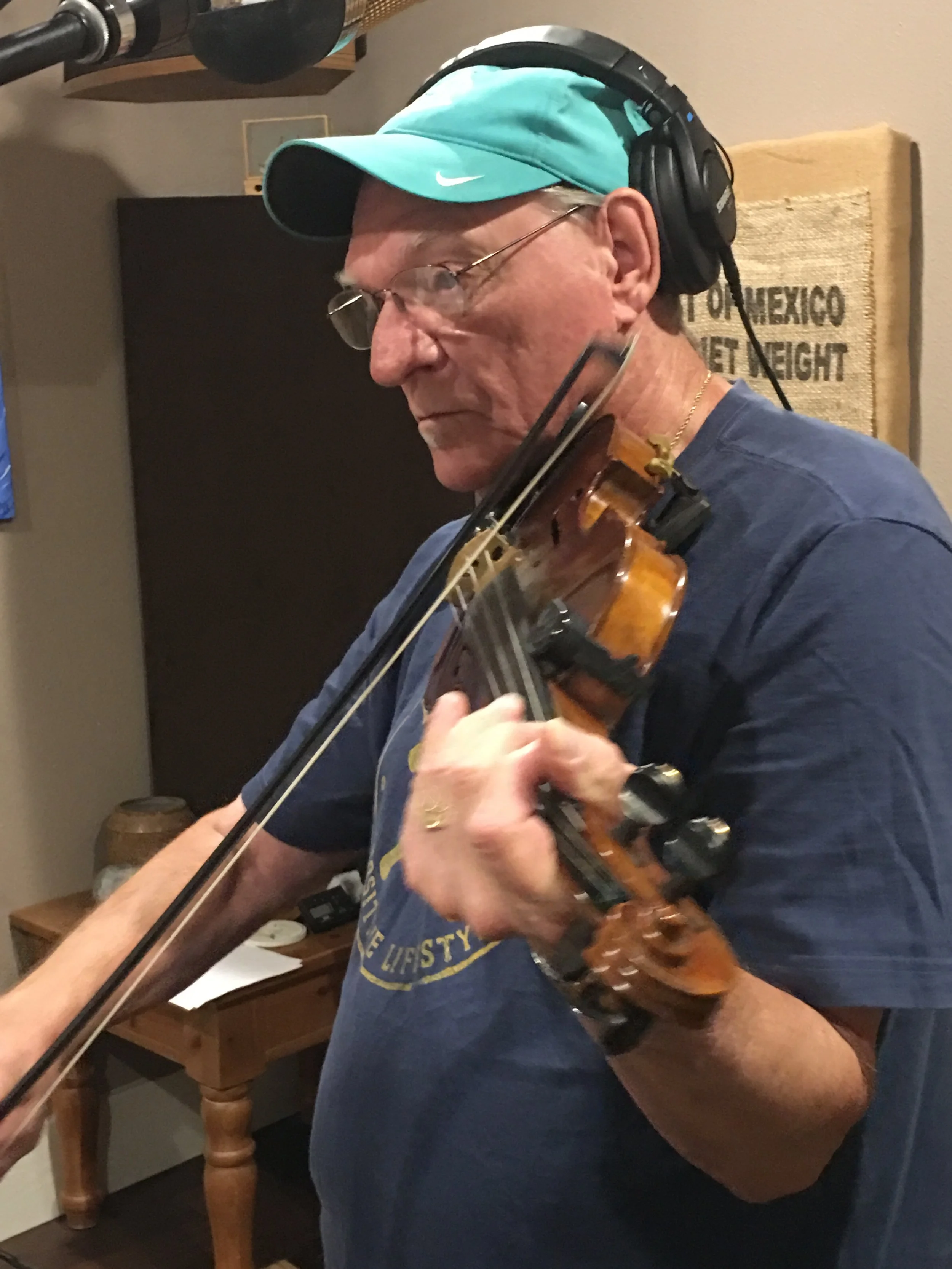 Fiddle player recording at Studio 2.0 in Seguin, Texas