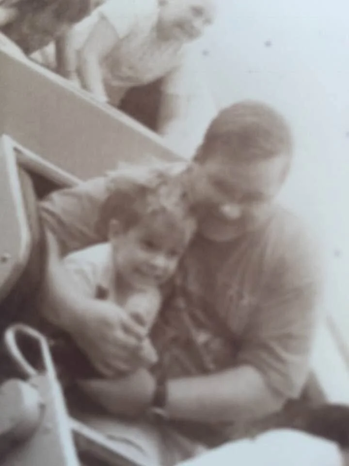 Jordan Crosby, grief therapist based in WEst Seattle at the west seattle center for grief, loss, and transition as a child with his father who tragically passed away