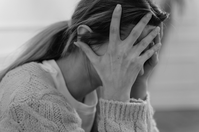 a woman experiencing traumatic loss with grief in west seattle