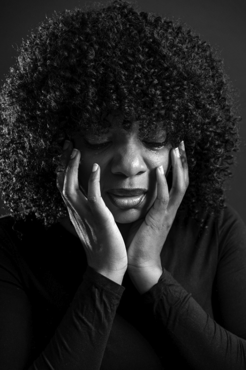 a woman experiencing traumatic loss and grief in west seattle