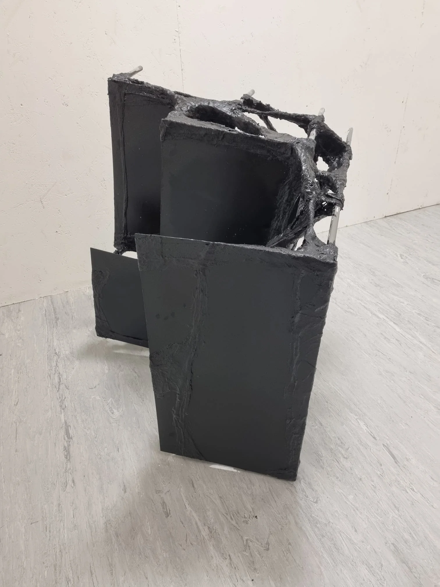 Untitled, 2024. Wood, metal, and plaster.