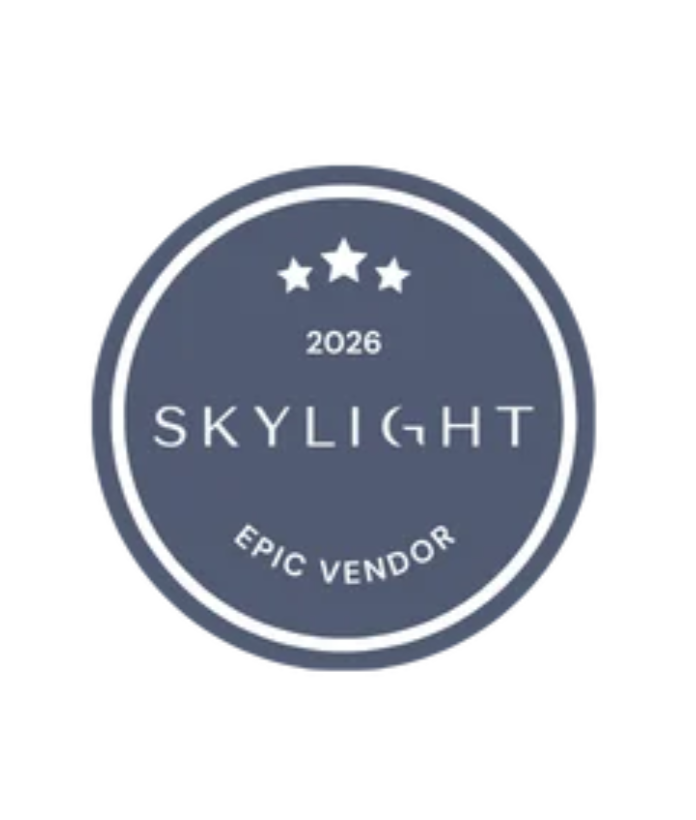 A circular badge with a dark blue background, three white stars at the top, the year 2026 in the center, the word SKYLIGHT with the letter I stylized as a star, and the phrase EPIC VENDOR at the bottom. Wildfire Cuisine Co. wood-fired catering at a C