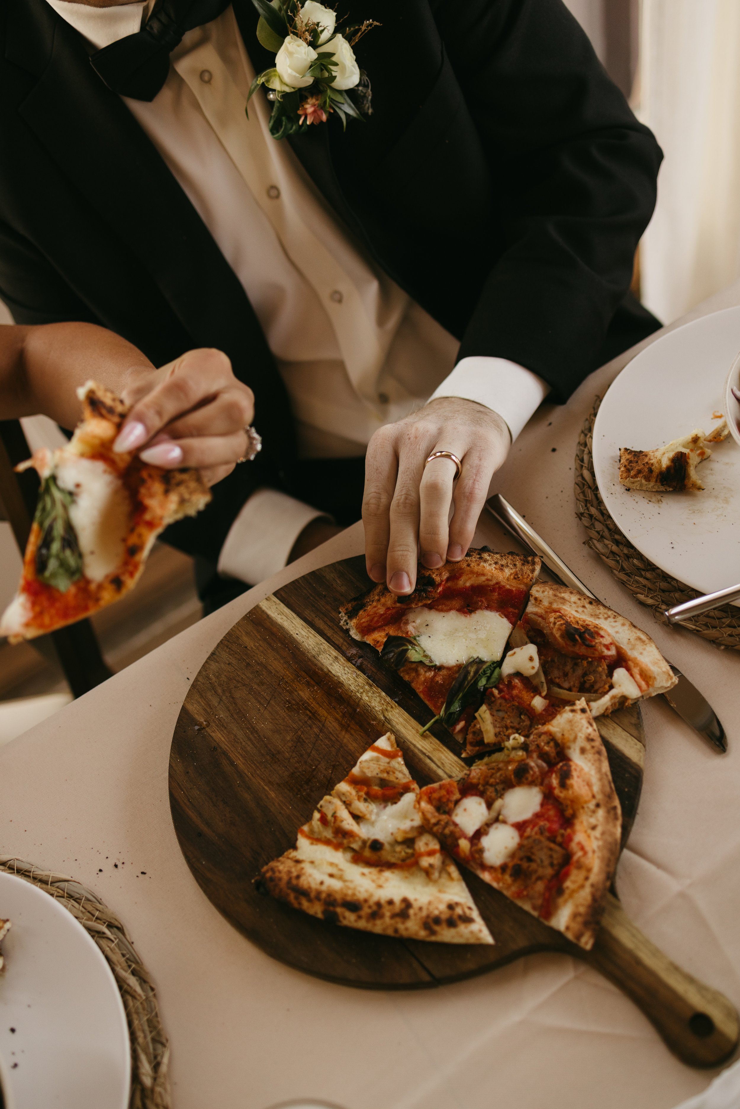 bride & groom pizza at Pikes Peak Ranch. Photography by Shiloh Rose Photo Film