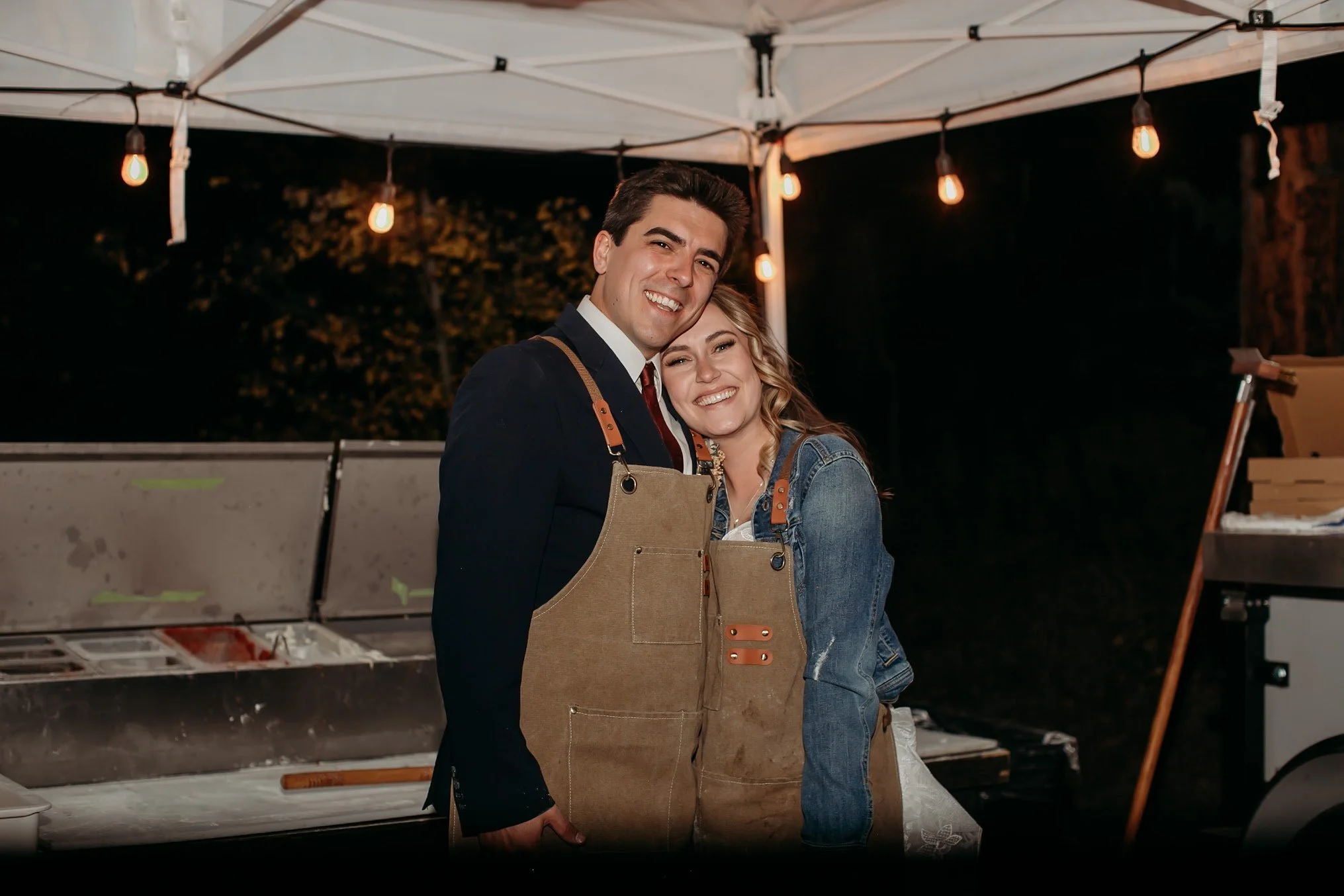 Guests enjoying Wildfire Cuisine Co. wood-fired catering at a Colorado wedding