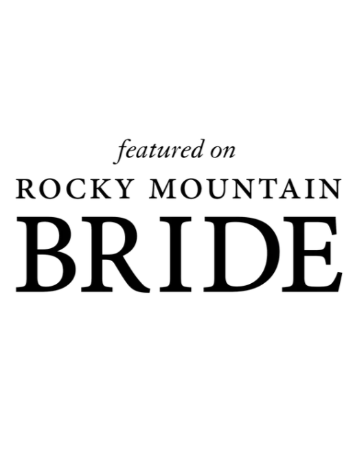Text reading, 'featured on Rocky Mountain Bride' in black font on a white background. Wildfire Cuisine Co. wood-fired catering at a Colorado wedding awards