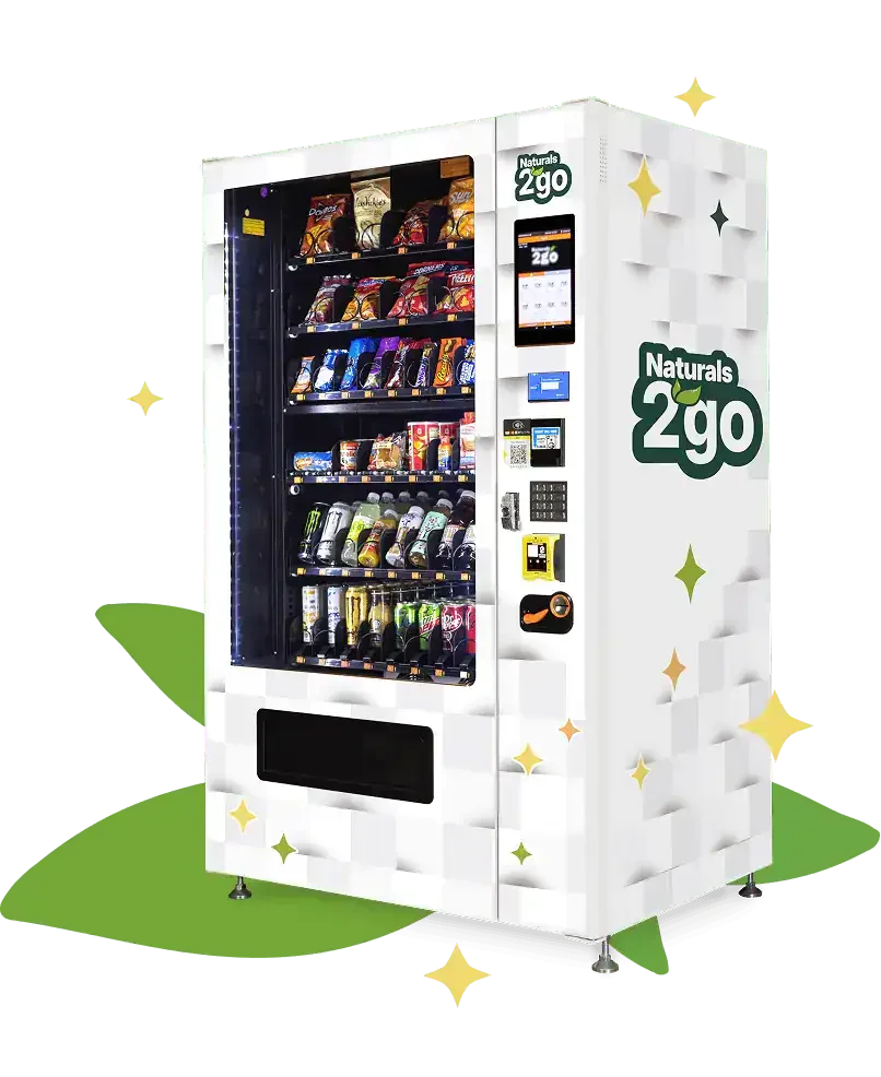 Vending machine selling snacks and beverages with a white exterior and the label 'Naturals 2go'.