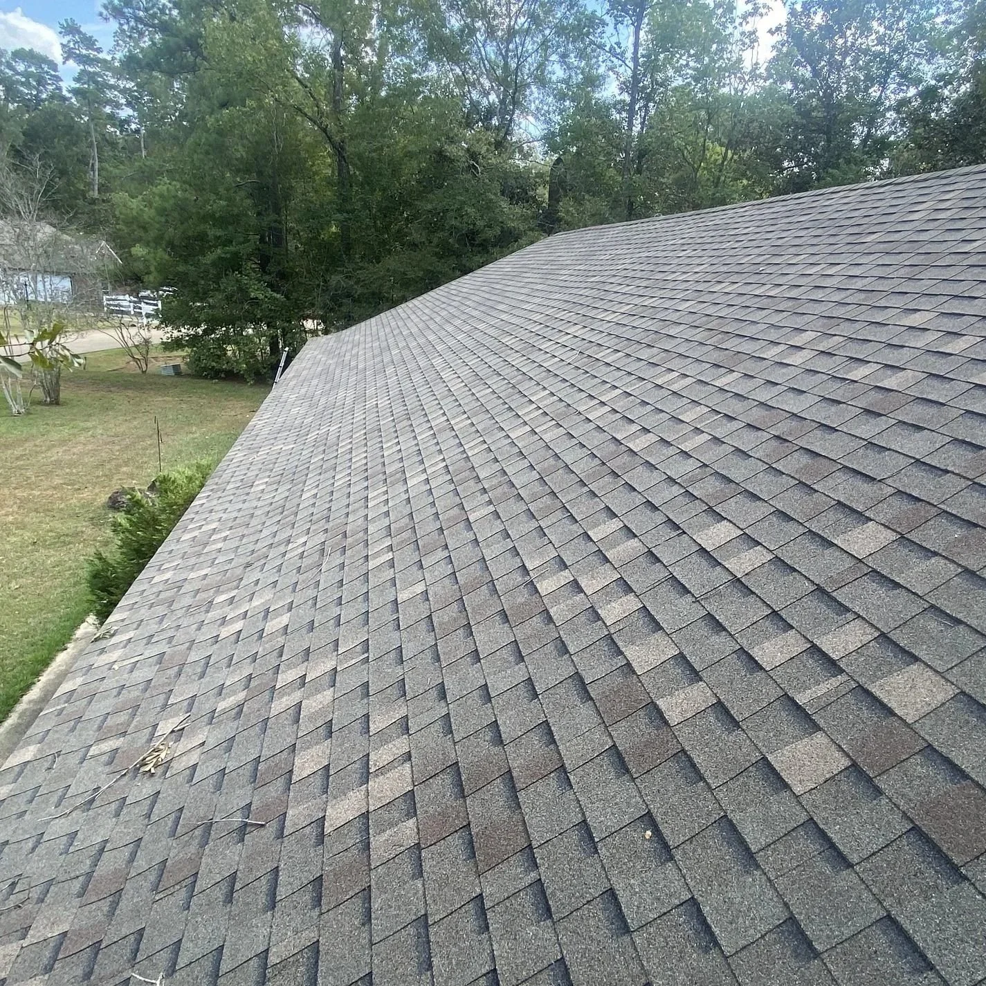 Large asphalt shingle roof installed with FORTIFIED roofing standards designed to withstand Louisiana hurricanes, wind uplift, and severe storm damage.